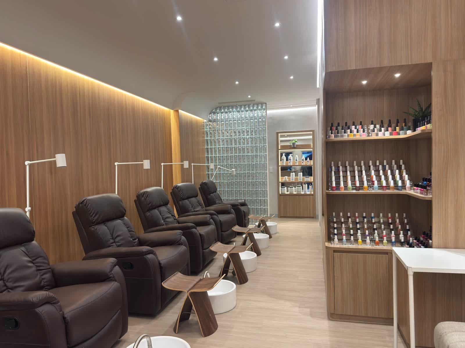 Relaxing nail spa chairs with foot baths at Ecru Nail Spa.