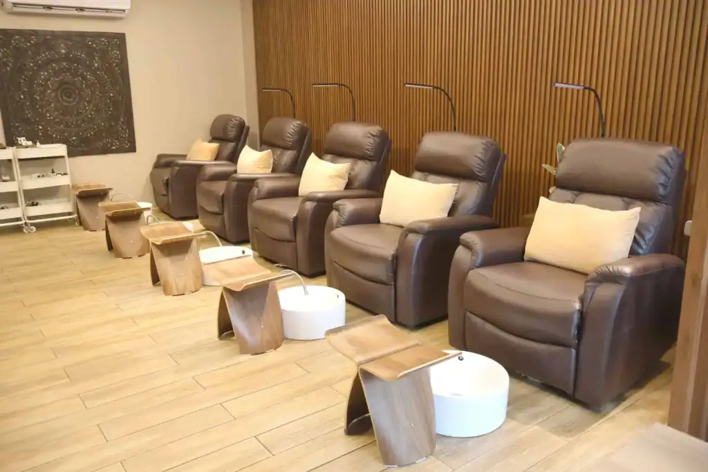 Relaxing pedicure chairs with foot baths at Ecru Nail Spa for a luxurious manicure experience.