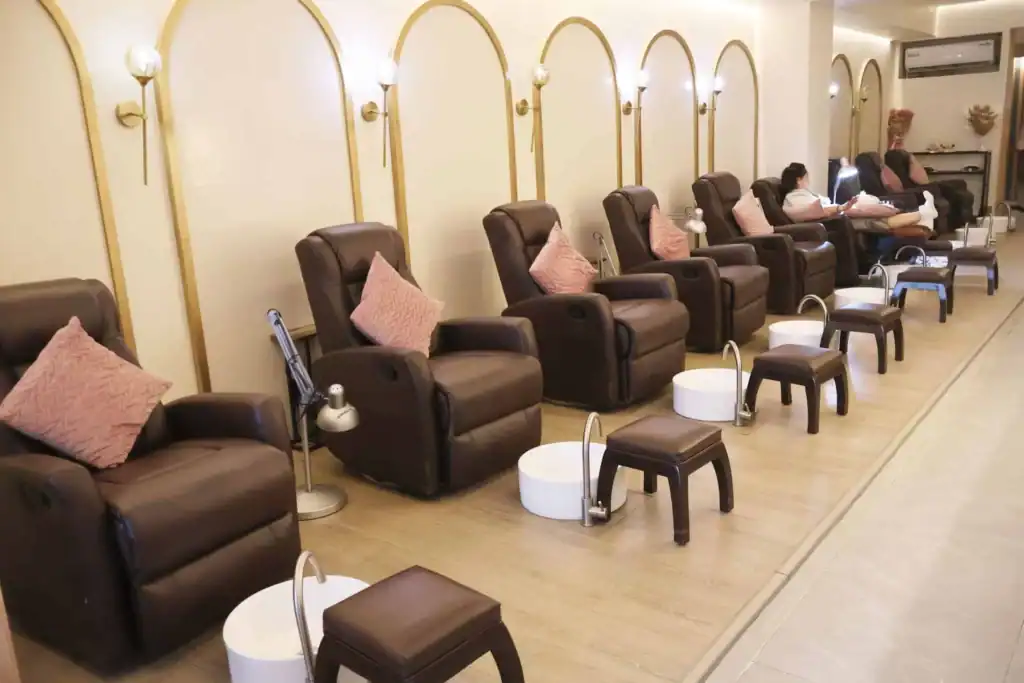 Comfortable pedicure chairs at Ecru Nail Spa for a luxurious manicure experience.